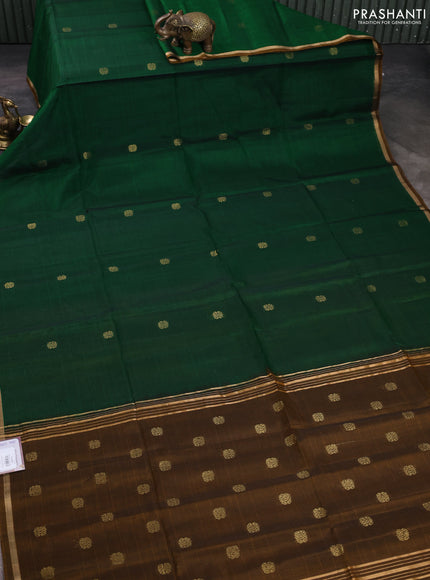 Kora silk cotton saree bottle green and dark mustard with allover zari woven buttas and small zari woven border