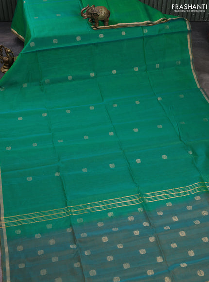 Kora silk cotton saree green and dual shade of mustard with allover zari woven buttas and small zari woven border