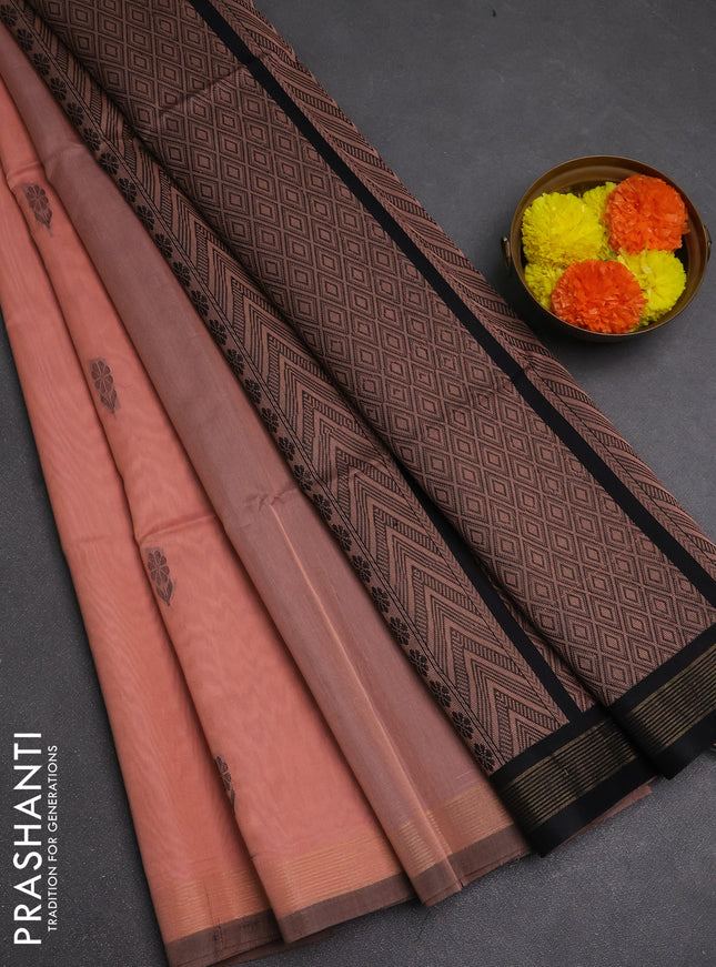 Kora silk cotton saree peach shade and black with thread woven buttas and small zari woven border