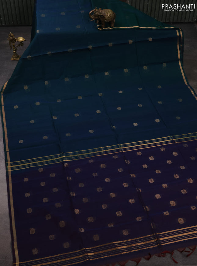 Kora silk cotton saree dual shade of bluish green and bkuish maroon with zari woven buttas and small zari woven border