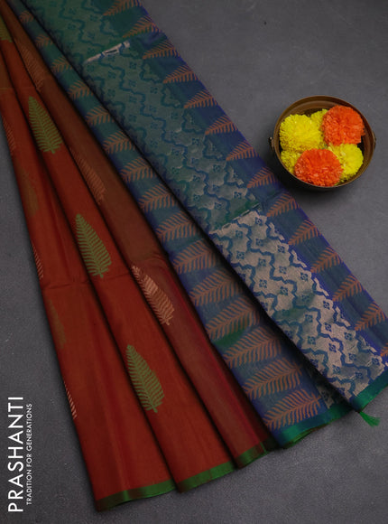 Kora silk cotton saree rust shade and dual shade of bluish green with thread & zari woven leaf buttas and piping border