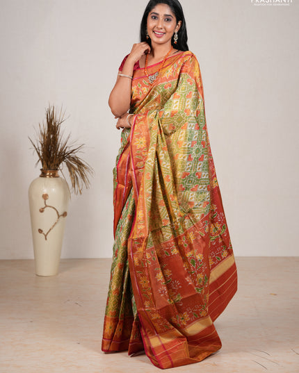 Rajkot patola silk saree green and red with allover ikat weaves and ikat woven zari border