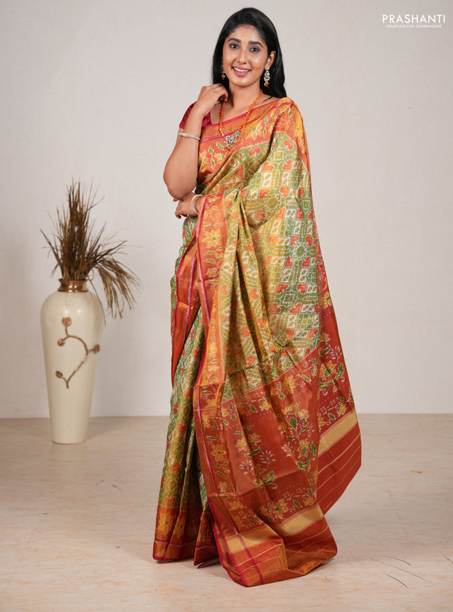 Rajkot patola silk saree green and red with allover ikat weaves and ikat woven zari border