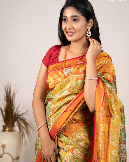 Rajkot patola silk saree green and red with allover ikat weaves and ikat woven zari border