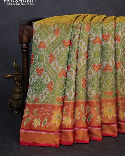 Rajkot patola silk saree green and red with allover ikat weaves and ikat woven zari border