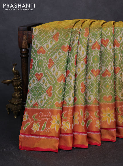 Rajkot patola silk saree green and red with allover ikat weaves and ikat woven zari border
