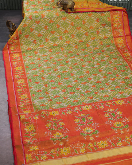 Rajkot patola silk saree green and red with allover ikat weaves and ikat woven zari border