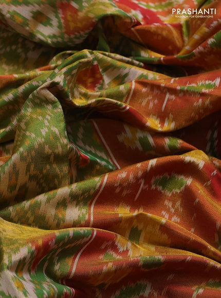 Rajkot patola silk saree green and red with allover ikat weaves and ikat woven zari border