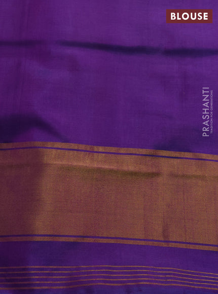 Rajkot patola silk saree dual shade of green and purple with allover ikat weaves and ikat woven zari border