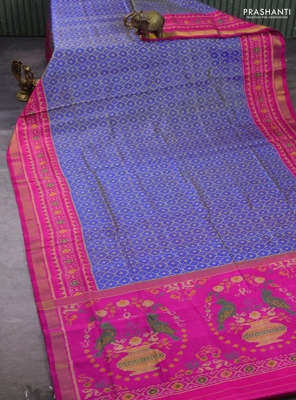 Rajkot patola silk saree dual shade of blue and magenta pink with allover ikat weaves and ikat woven zari border