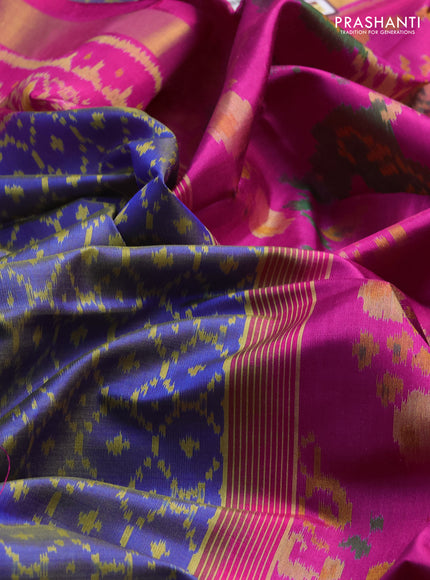 Rajkot patola silk saree dual shade of blue and magenta pink with allover ikat weaves and ikat woven zari border