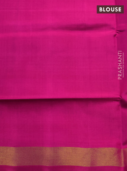 Rajkot patola silk saree dual shade of blue and magenta pink with allover ikat weaves and ikat woven zari border