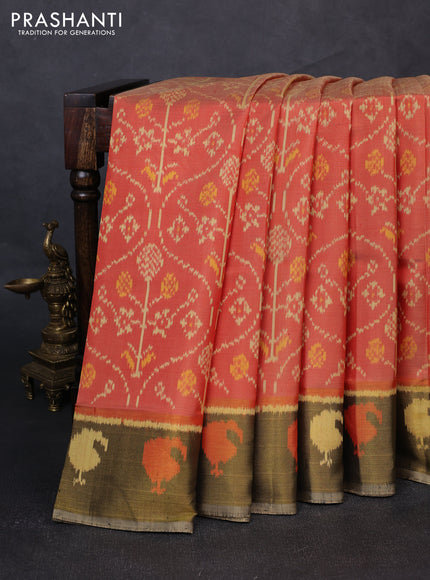 Rajkot patola silk saree orange and elaichi green with allover ikat weaves and ikat woven zari border