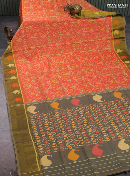 Rajkot patola silk saree orange and elaichi green with allover ikat weaves and ikat woven zari border
