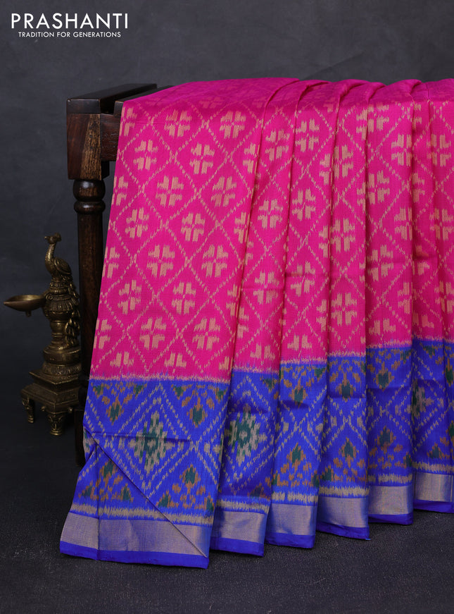 Rajkot patola silk saree magenta pink and blue with allover ikat weaves and ikat woven zari border