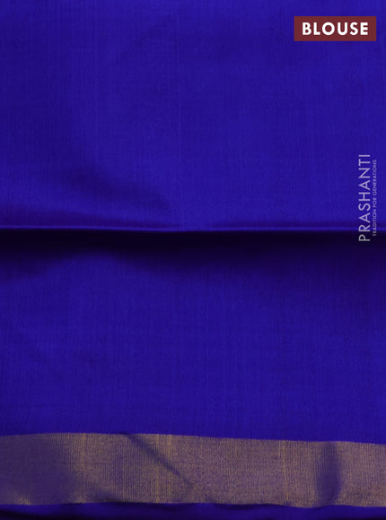 Rajkot patola silk saree magenta pink and blue with allover ikat weaves and ikat woven zari border