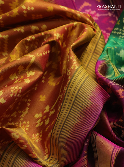 Rajkot patola silk saree dual shade of dark mustard and purple green with allover ikat weaves and ganga jamuna border