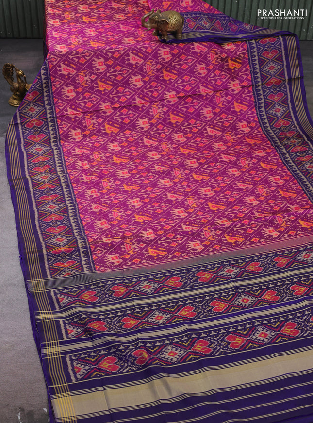 Rajkot patola silk saree purple and violet with allover patola weaves and ikat woven border