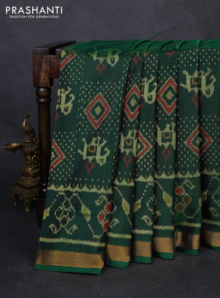 Rajkot patola silk saree green with allover patola weaves and zari woven border