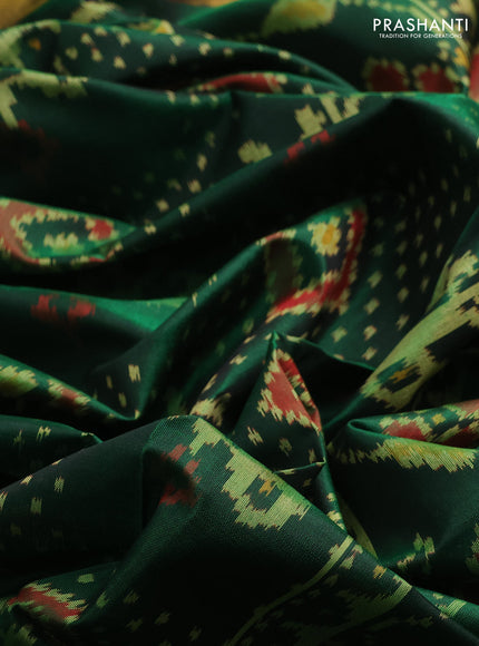 Rajkot patola silk saree green with allover patola weaves and zari woven border
