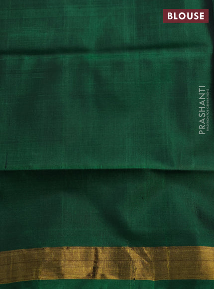 Rajkot patola silk saree green with allover patola weaves and zari woven border