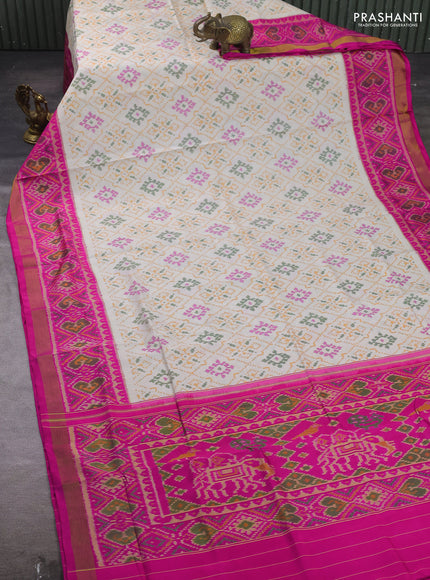 Rajkot patola silk saree cream and pink with allover ikat weaves and ikat woven zari border