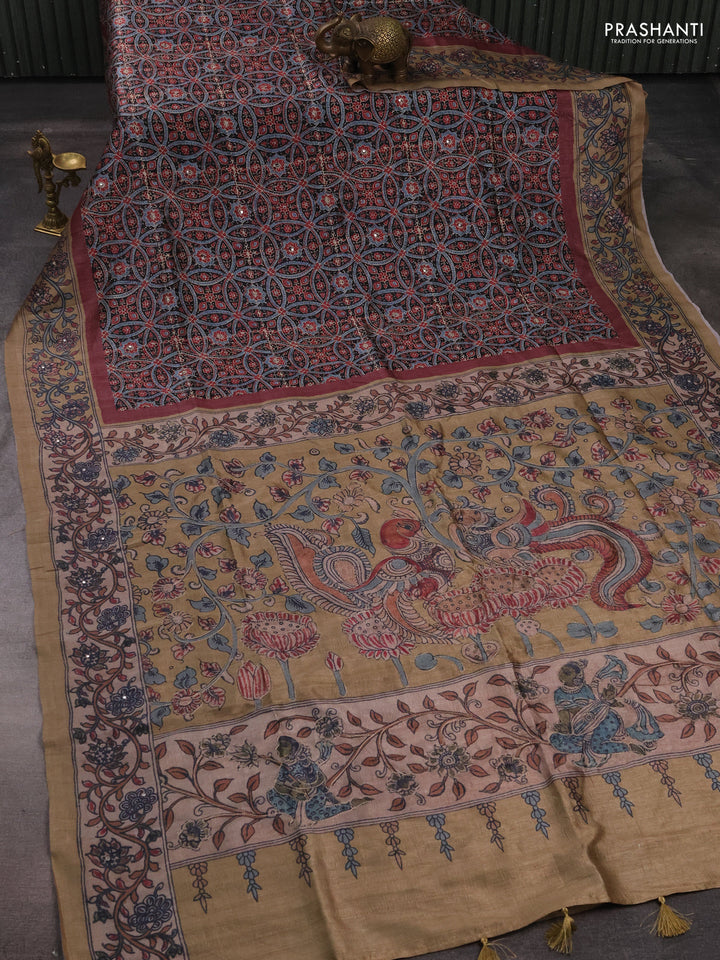 Matka tussar saree maroon and dark beige with allover ajrakh prints & mirror work and kalamkari prints & embroidery pallu