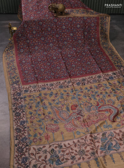 Matka tussar saree maroon and dark beige with allover ajrakh prints & mirror work and kalamkari prints & embroidery pallu