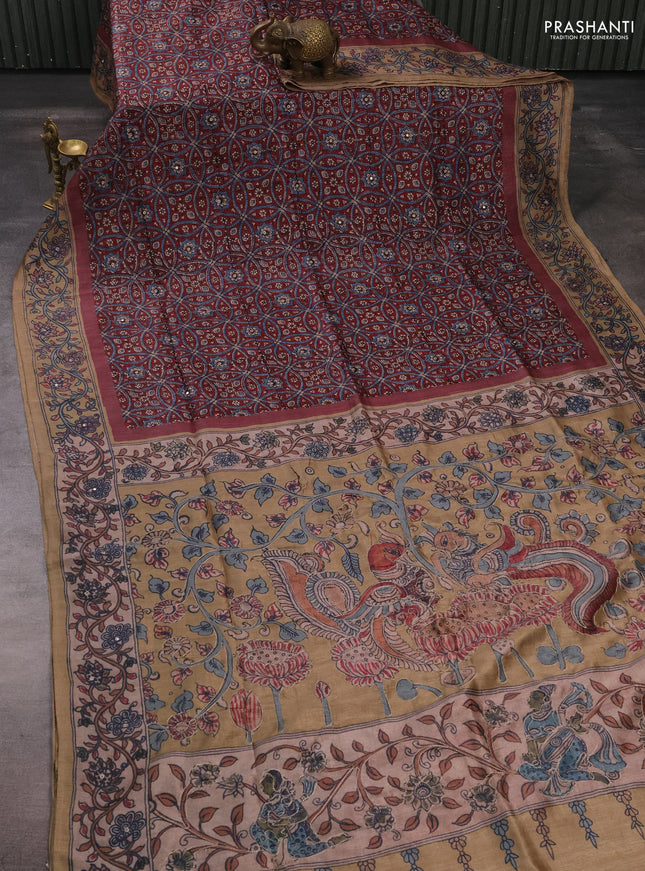 Matka tussar saree maroon and dark beige with allover ajrakh prints & mirror work and kalamkari prints & embroidery pallu