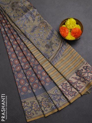 Matka tussar saree grey and elaichi green with allover ajrakh prints & mirror work and kalamkari prints & embroidery pallu