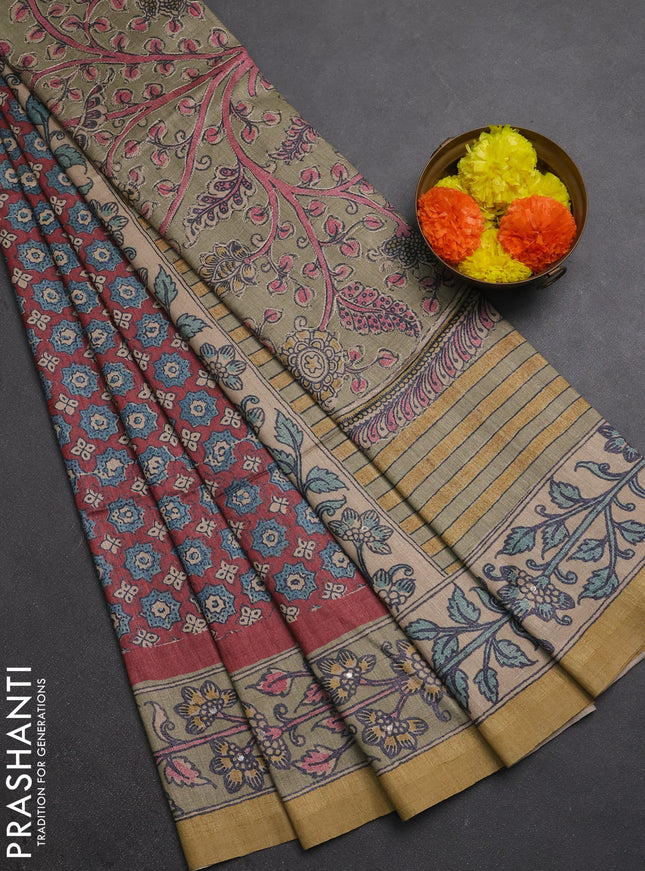Matka tussar saree maroon and elaichi green with allover ajrakh prints & mirror work and kalamkari prints & embroidery pallu