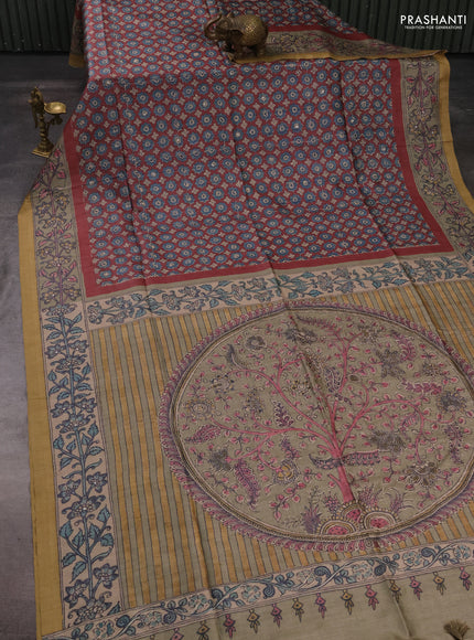 Matka tussar saree maroon and elaichi green with allover ajrakh prints & mirror work and kalamkari prints & embroidery pallu
