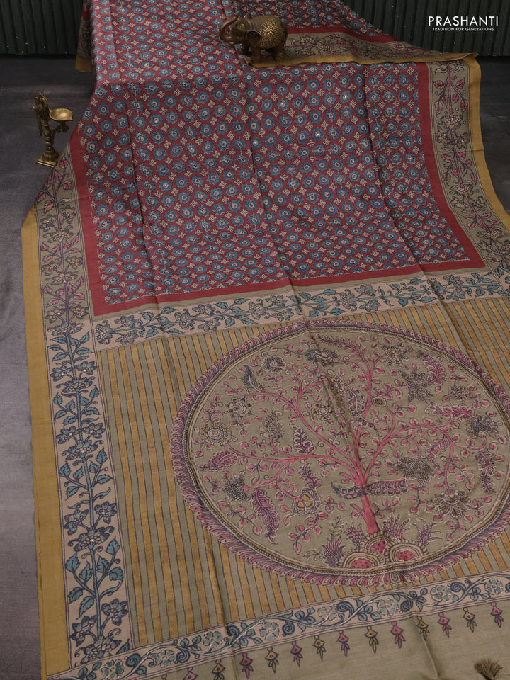 Matka tussar saree maroon and elaichi green with allover ajrakh prints & mirror work and kalamkari prints & embroidery pallu
