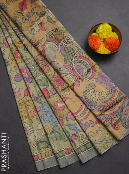 Matka tussar saree pista green and mustard yellow with allover kalamkari prints & mirror work and kalamkari prints & embroidery pallu