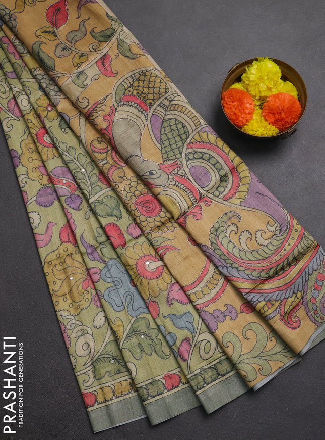 Matka tussar saree pista green and mustard yellow with allover kalamkari prints & mirror work and kalamkari prints & embroidery pallu