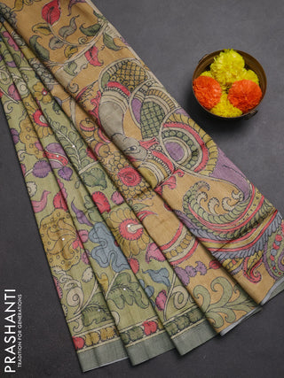 Matka tussar saree pista green and mustard yellow with allover kalamkari prints & mirror work and kalamkari prints & embroidery pallu