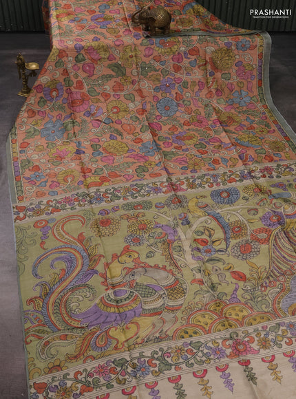Matka tussar saree pale orange and pista green with allover kalamkari prints & mirror work and kalamkari prints & embroidery pallu