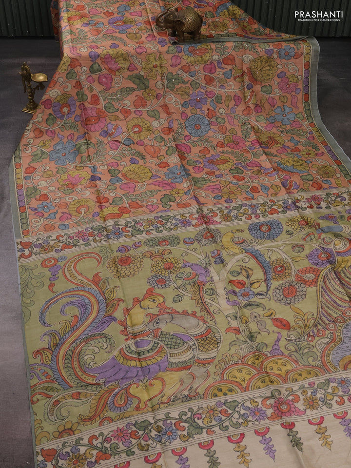 Matka tussar saree pale orange and pista green with allover kalamkari prints & mirror work and kalamkari prints & embroidery pallu