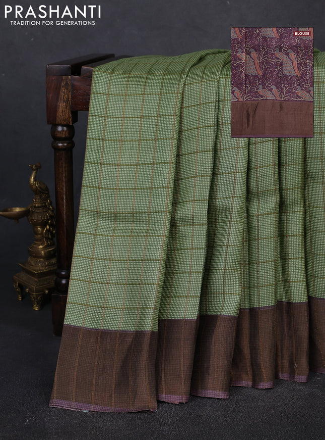 Pure tussar silk saree pista green and wine shade with allover zari checked pattern and zari woven border