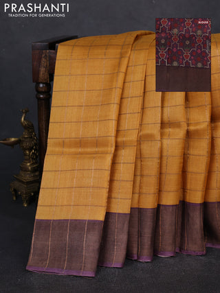 Pure tussar silk saree mustard yellow and purple with allover zari checked pattern and zari woven border