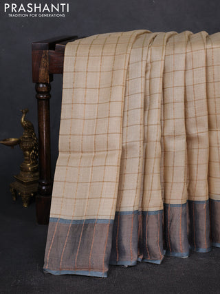 Pure tussar silk saree cream and peacock blue with allover zari checked pattern and zari woven border