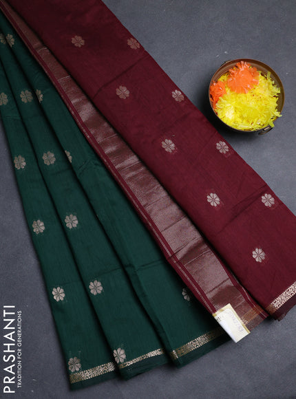 Semi maheswari cotton saree bottle green and magenta pink with allover zari woven buttas and small zari woven border