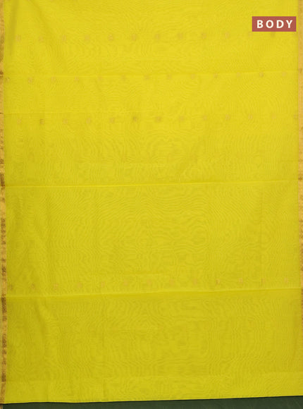 Semi maheswari cotton saree lime yellow and green shade with allover zari woven buttas and small zari woven border