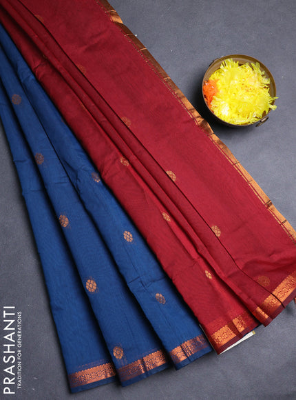 Semi maheswari cotton saree peacock blue and deep maroon with allover copper zari woven buttas and small copper zari woven border