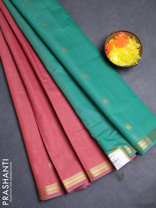 Semi maheswari cotton saree peach shade and teal green with allover zari woven buttas and small zari woven border