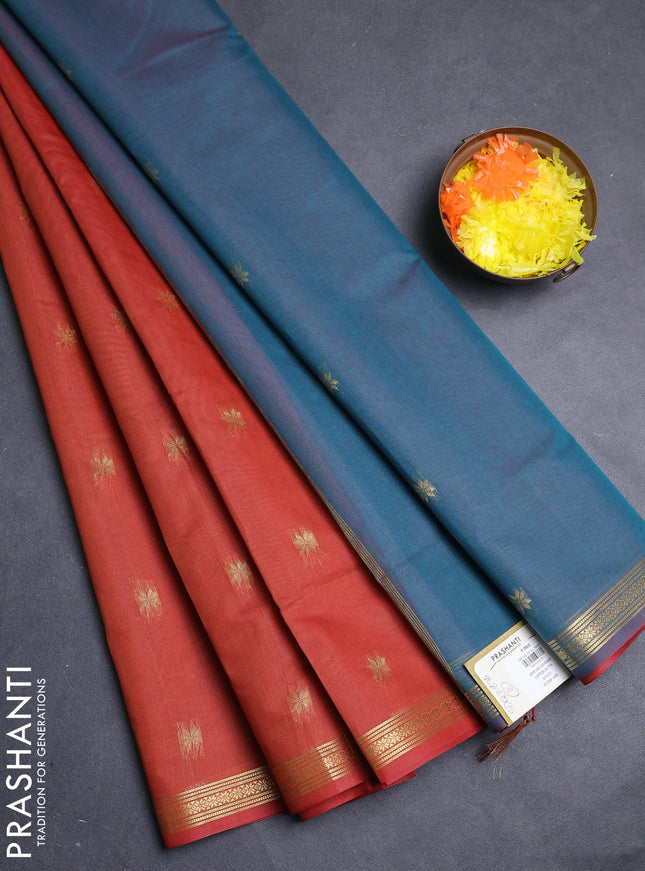 Semi maheswari cotton saree rust shade and peacock green with allover zari woven buttas and small zari woven border