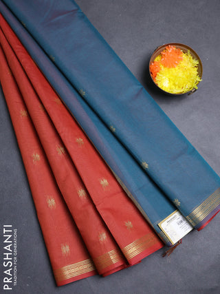 Semi maheswari cotton saree rust shade and peacock green with allover zari woven buttas and small zari woven border
