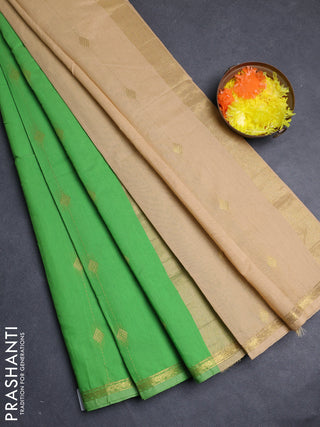 Semi maheswari cotton saree light green and pale yellow with allover zari woven buttas and small zari woven border