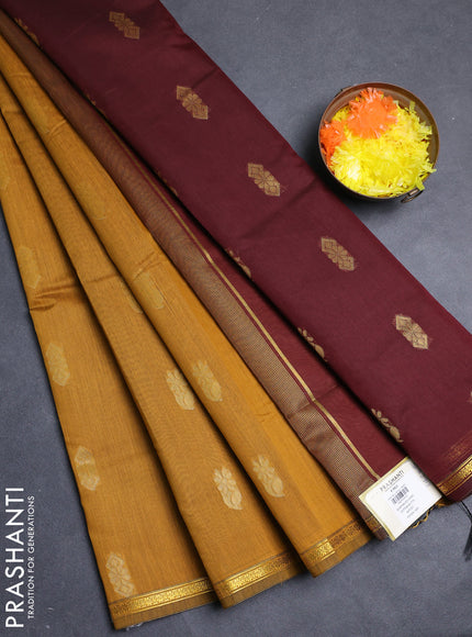 Semi maheswari cotton saree dark mustard and deep wine with allover zari woven buttas and small zari woven border