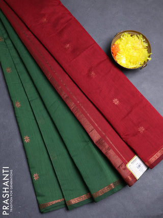 Semi maheswari cotton saree green and deep maroon with allover copper zari woven buttas and small copper zari woven border